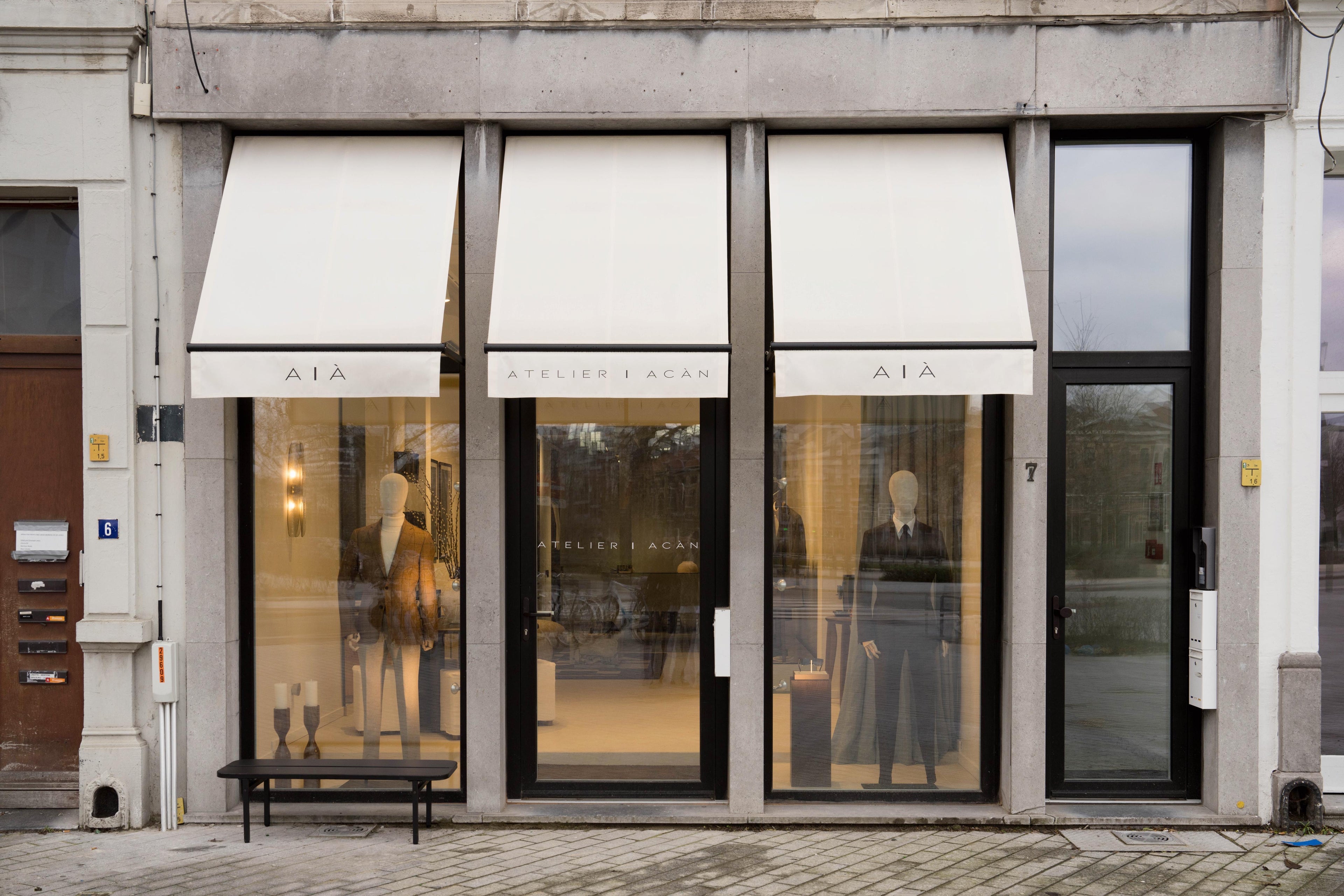 Atelier ACÀN Antwerp storefront – where luxury suits meet timeless craftsmanship.