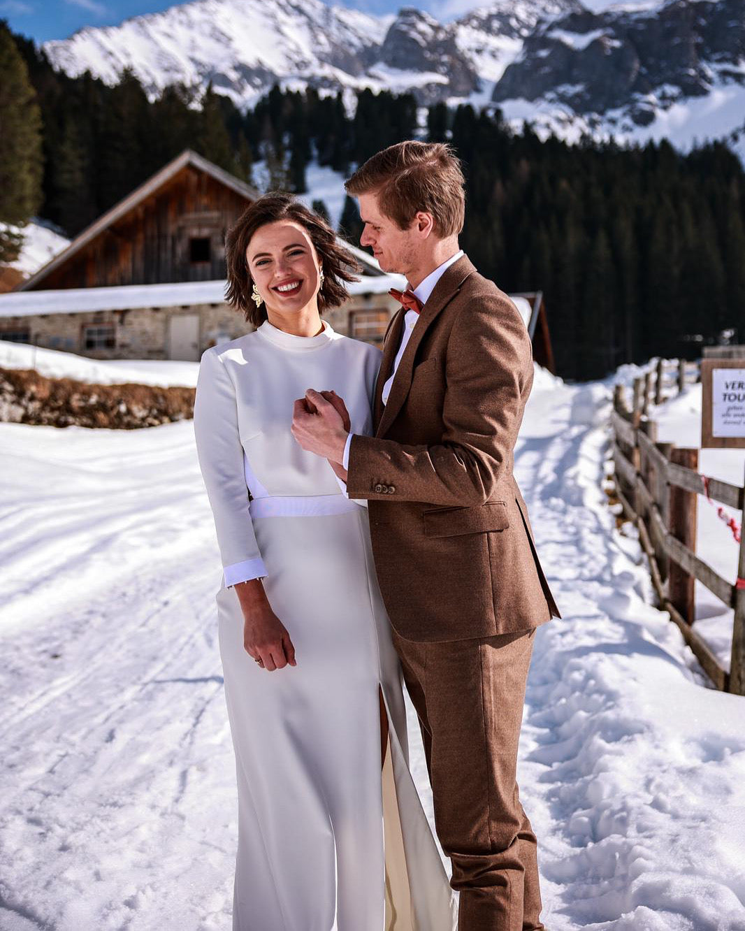 Newlywed couple celebrating, groom in a handcrafted Atelier ACÀN tuxedo. Client stories at Atelier ACÀN.