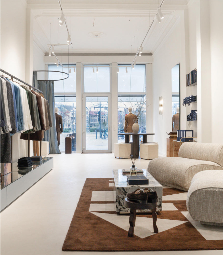 Inside Atelier ACÀN’s Antwerp store – a refined space for bespoke tailoring and personalized fittings.